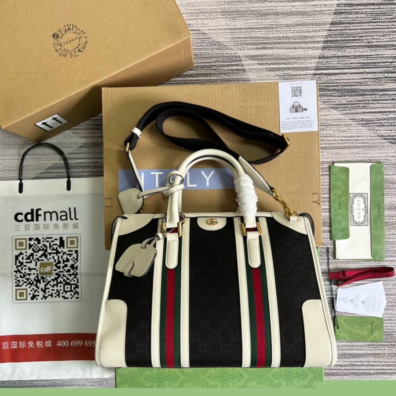 G*u*i top handle bags